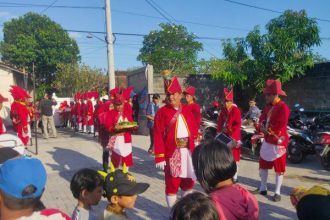 Upacara nyadran sebagai salah satu tradisi di Desa Panggungharjo yang masih dilakukan warga setempat Sumber Foto: panggungharjo.desa.id