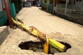 keterangan foto: jalan desa, sumber foto: tribun gorontalo.com