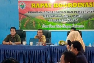Dinas PMD Kabupaten Kapuas saat melaksanakan rapat kerja bersama para pendamping desa di Aula Kantor DPMD setempat.