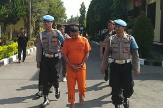 Kepala Desa Tirto berinisial AM saat ditangkap Polresta Magelang, Selasa (4/6/2024). Sumber : Eko Susanto/detikJateng