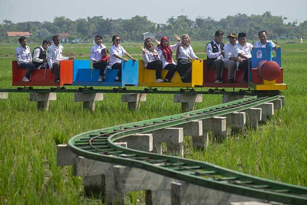 Desa Tirtomarto: Dari Lahan Tak Produktif Jadi Wahana Wisata yang Tingkatkan Pendapatan Desa. Sumber: Solopos.com