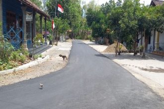 Jalan Hotmix baru di Desa Kepet sukses berkat BKK APBD. Sumber : radarbangsa.co.id