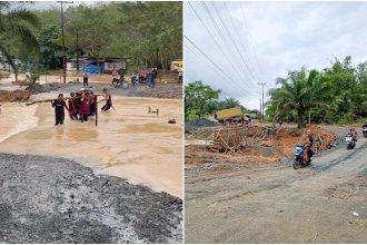 Jalan transmigrasi di Desa Sidomulyo, Kecamatan Mantewe, Kabupaten Tanahbumbu, terendam air.