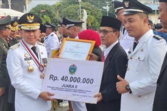 Serah Terima Penghargaan BUM Desa Terbaik tingkat Provinsi Sumatera Utara. Sumber: Istimewa