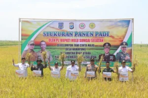 Syukuran panen padi Poktan Cinta Maju, Desa Hamayung, Kecamatan Daha Utara, Hulu Sungai Selatan, Kalimantan Selatan. Sumber: HO-Diskominfo HSS