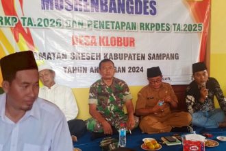 PJ Kades, Nurhasim baju batik saat memberikan sambutan. Sumber : mmcnews.id