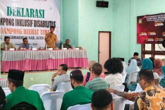 Keuchik Reuhat Tuha Heriandi pada saat sambutan Deklarasi Gampong Inklusif Disabilitas. Sumber:posaceh.com