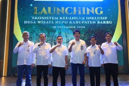 Foto bersama kegiatan Launching program Ekosistem Keuangan Inklusif (EKI) di Desa Nepo. Sumber: tribun-timur.com