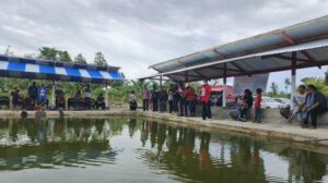 Suasana lomba memancing yang digelar BUM Desa Merah Putih, Kampung Nawaripi. Sumber ; tribunpapua.com