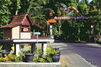 Gapura masuk Desa Wisata Adat Osing Kemiren, Kecamatan Glagah, Kabupaten Banyuwangi, Jawa Timur. Kolomdesa/HO-Pemkab Banyuwangi