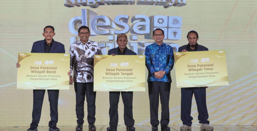 Kepala Desa Wawowae saat menerima penghargaan sebagai Desa Potensial Wilayah Tengah. Sumber foto: website resmi keuangannews.id